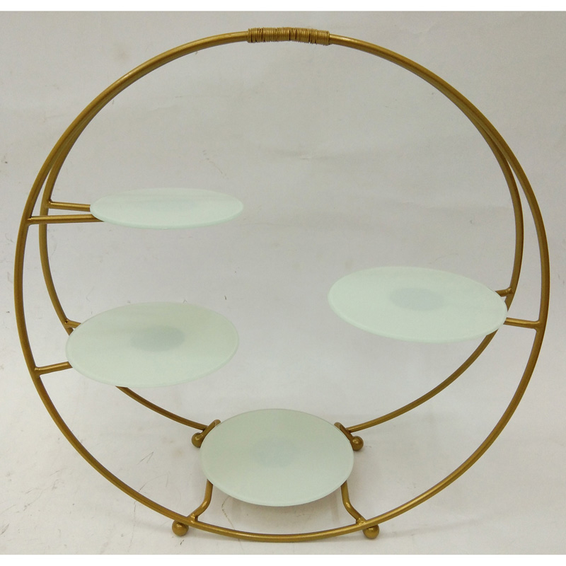 Gold metal cake stand with 4 round white glass tiers