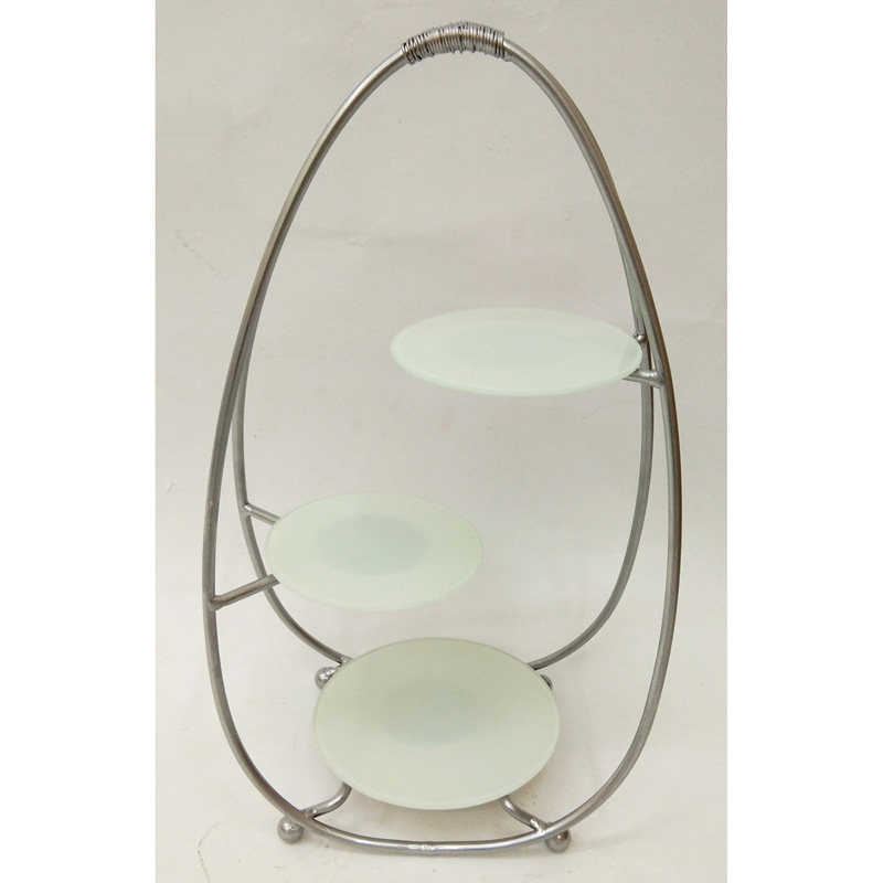 Silver oval metal cake stand with 3 round white glass tiers