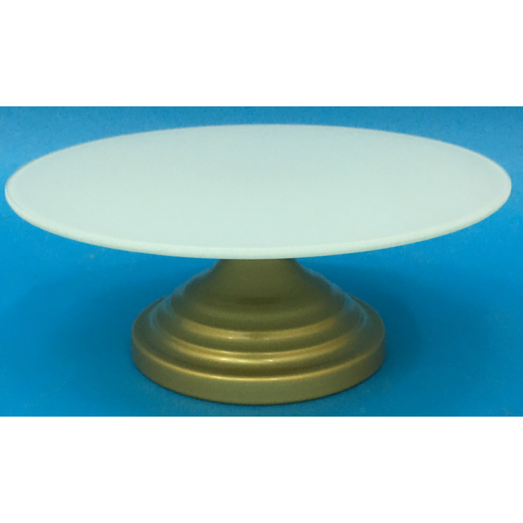 Round white glass cake stand with gold metal base