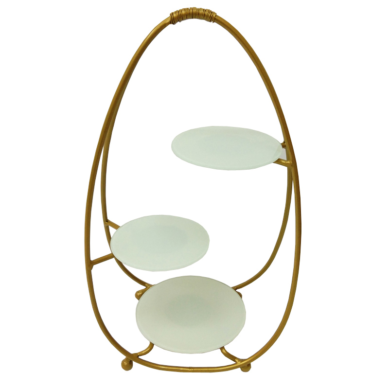 Gold oval metal cake stand with 3 round white glass tiers