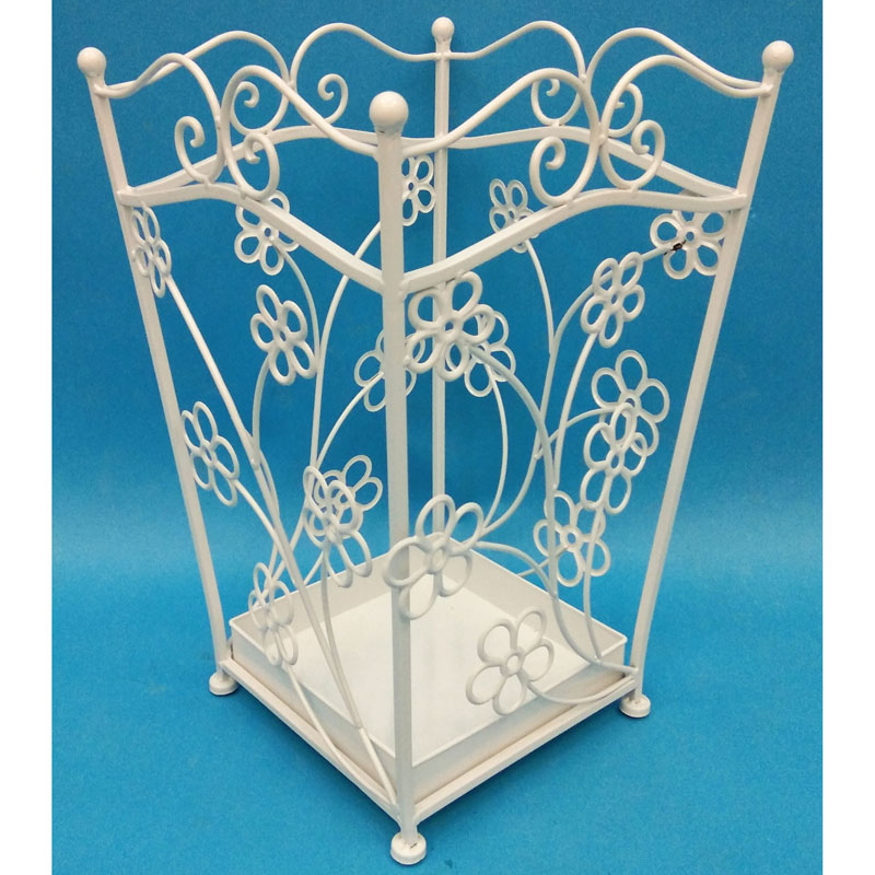 White square metal umbrella holder with flower decor and curved iron