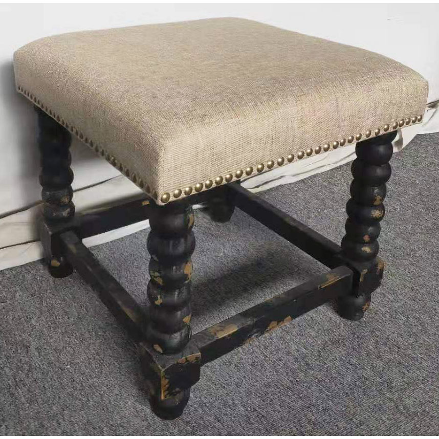 Ottoman with shaped wood legs