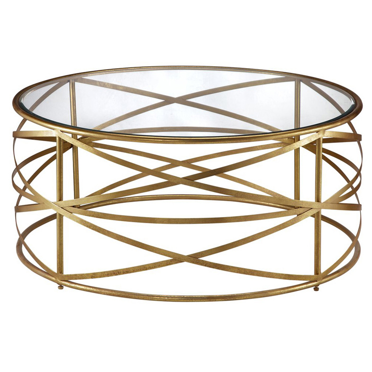 Gold round metal coffee table with clear glass top