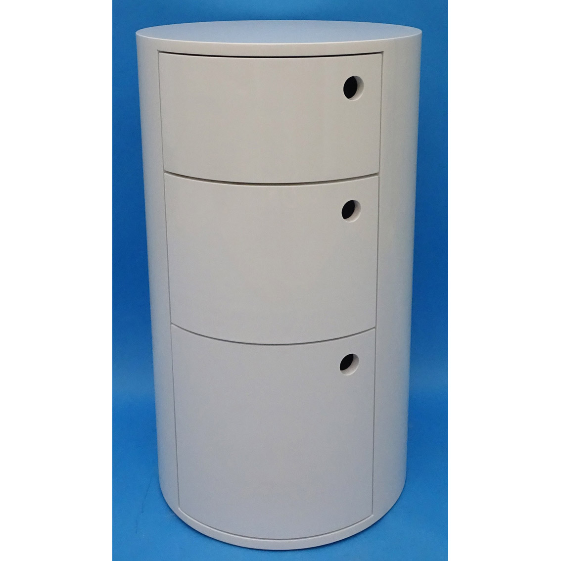 White round wood chest with 3 drawers